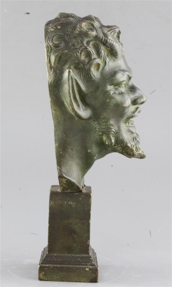 An early 20th century green patinated bronze mask of a laughing satyr, 12.5in.